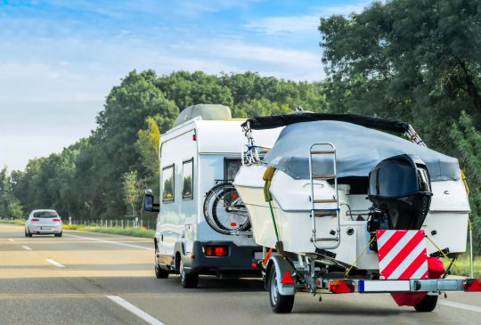Caravan,And,Trailer,For,Motor,Boats,On,The,Road,In